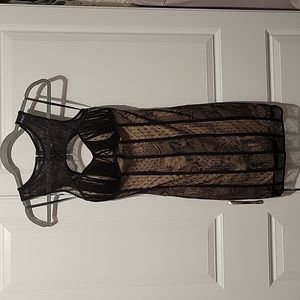 Bebe black lace dress with nude base layer size XS